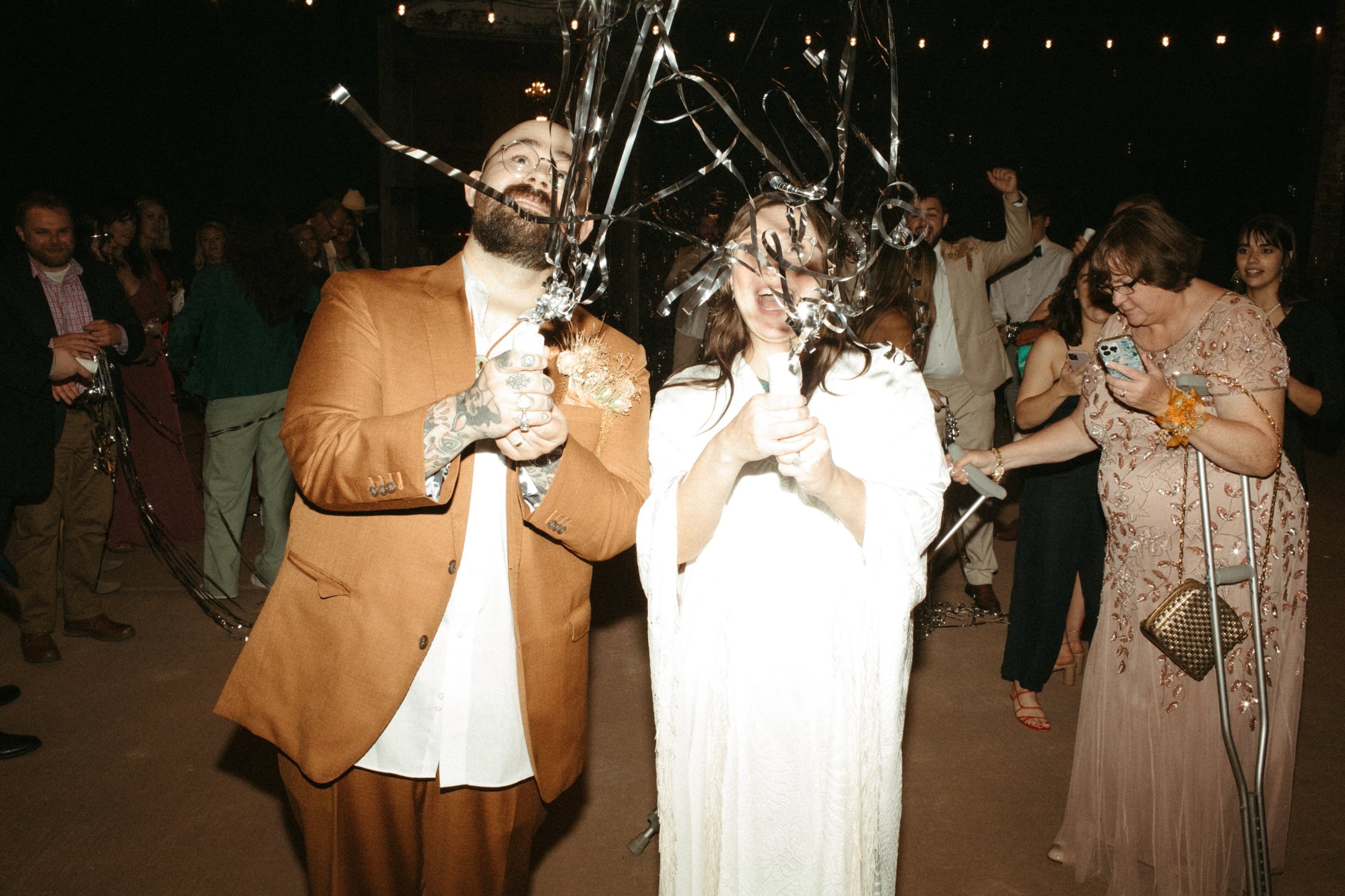silver streamers wedding exit