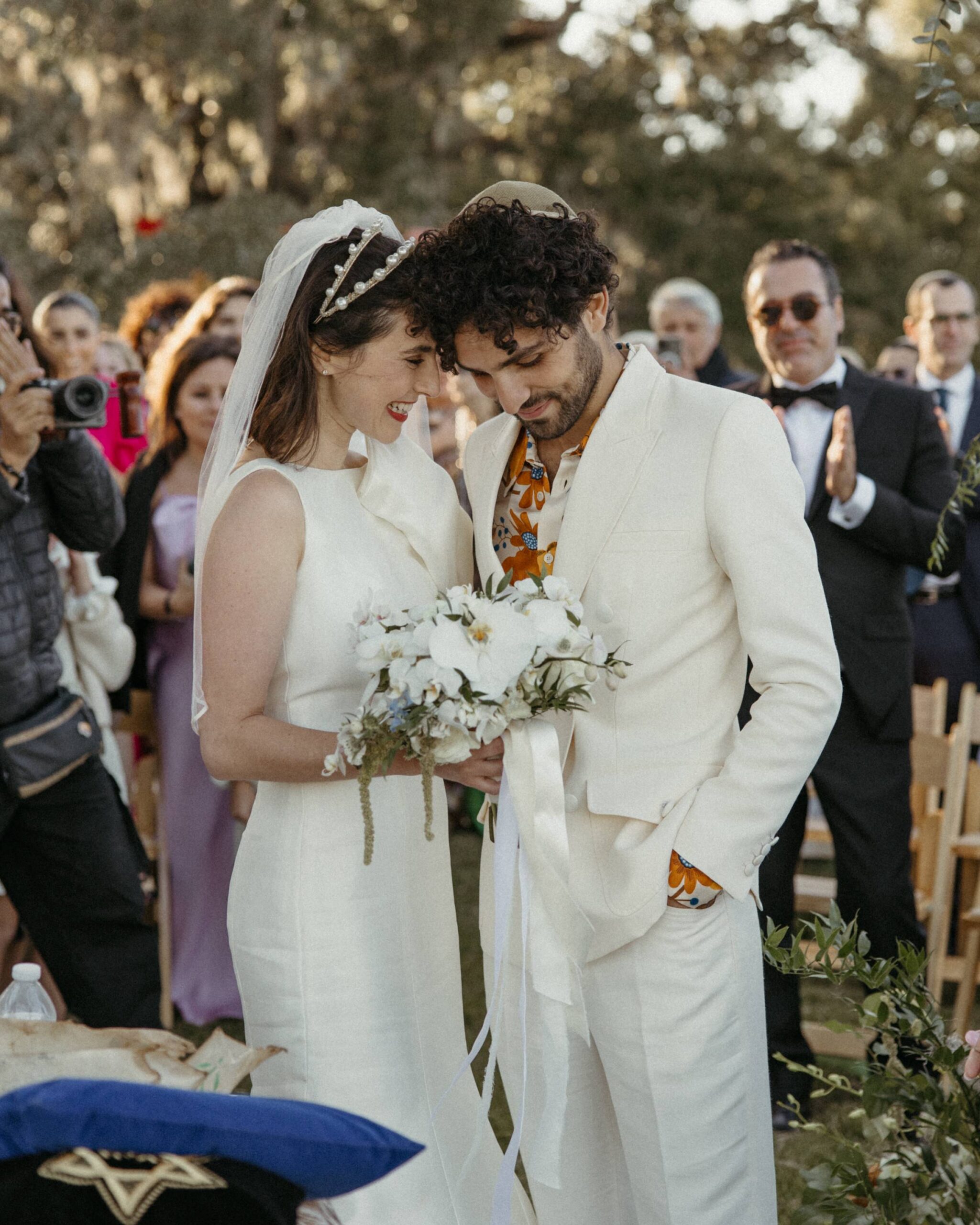 white wedding suit groom
